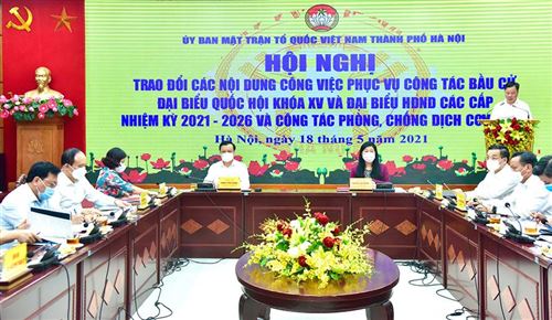 Ủy viên Bộ Chính trị, Bí thư Thành ủy Hà Nội Đinh Tiến Dũng làm việc với Ủy ban MTTQ Việt Nam Thành phố và các tổ chức chính trị - xã hội Thành phố trao đổi các nội dung công việc phục vụ công tác bầu cử và công tác phòng chống dịch Covid-19.